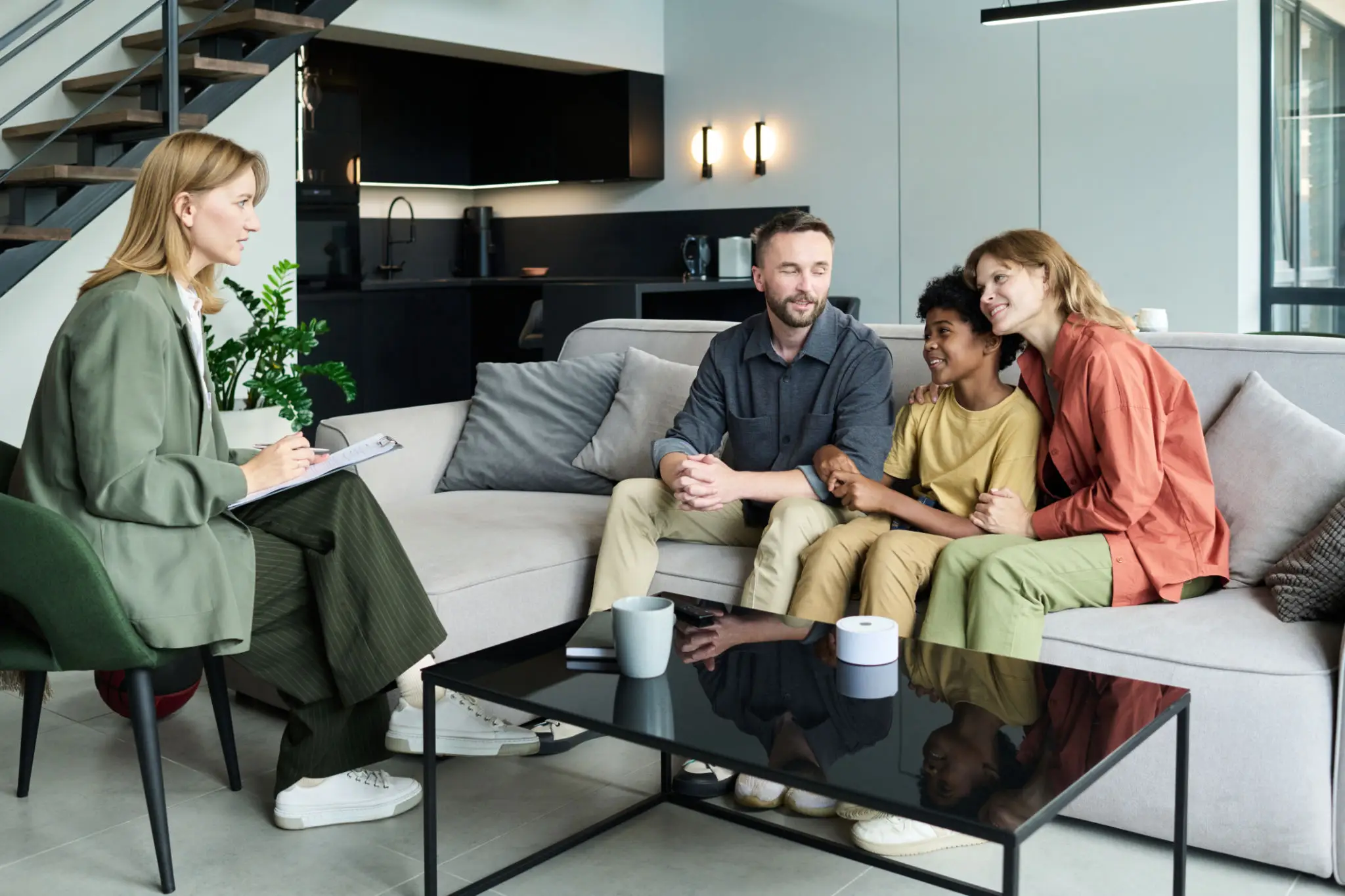 Family therapy session in modern living room
