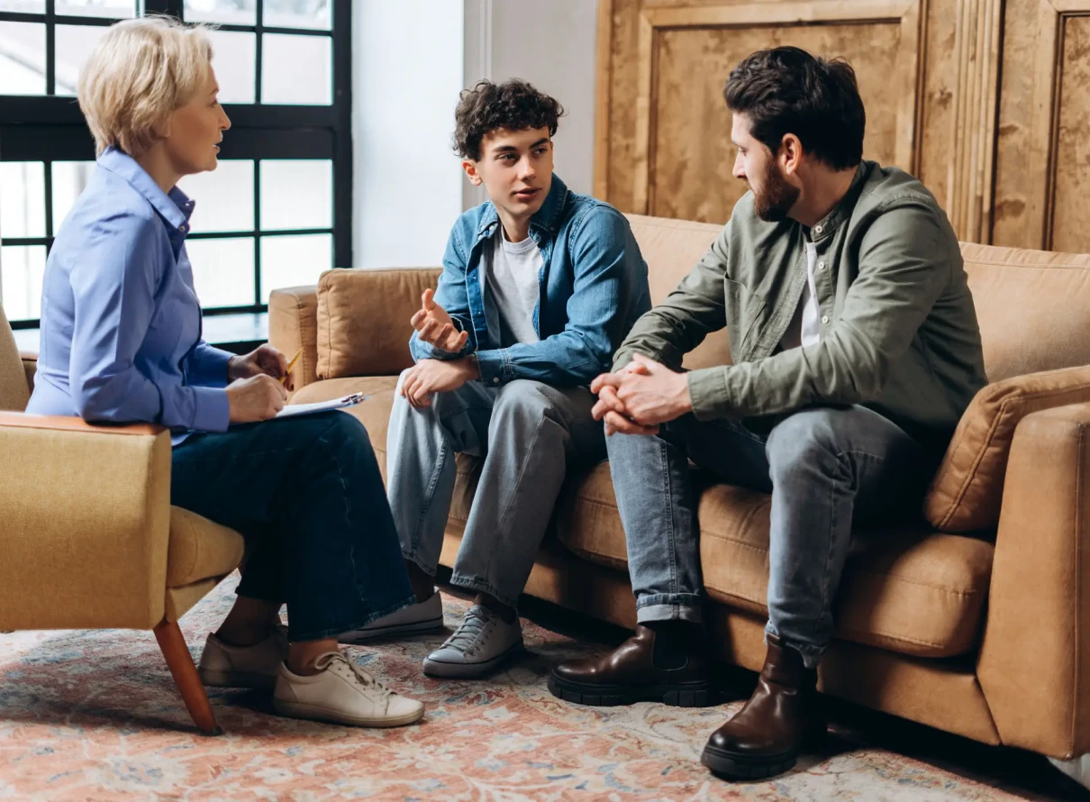 Counseling session with therapist and clients