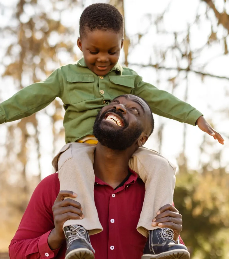 Happy father and son enjoying outdoors